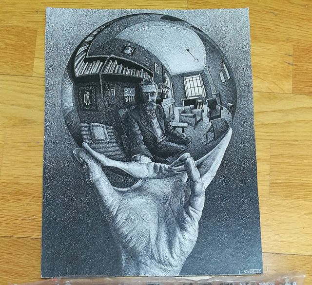 Puzzle M.C.ESCHER (Mano con sfera)