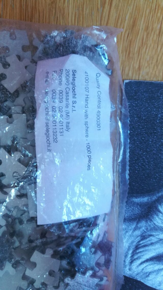 Puzzle M.C.ESCHER (Mano con sfera)