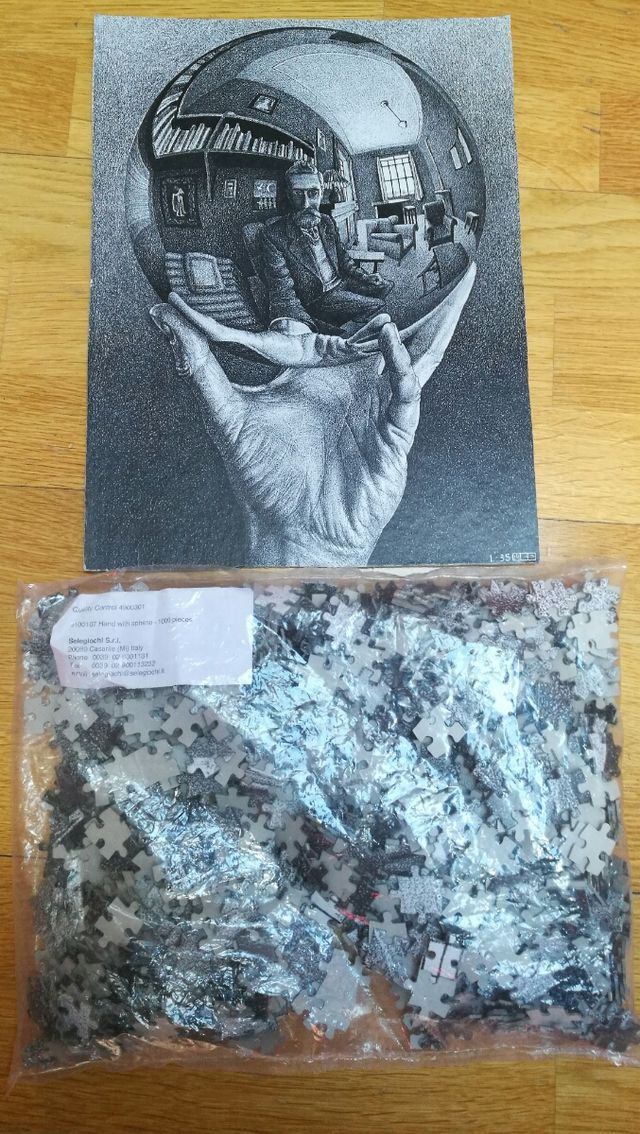 Puzzle M.C.ESCHER (Mano con sfera)