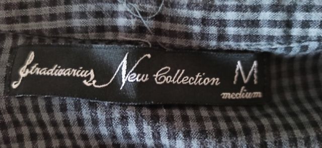vestido corto cuadros.talla m.stradivarius.