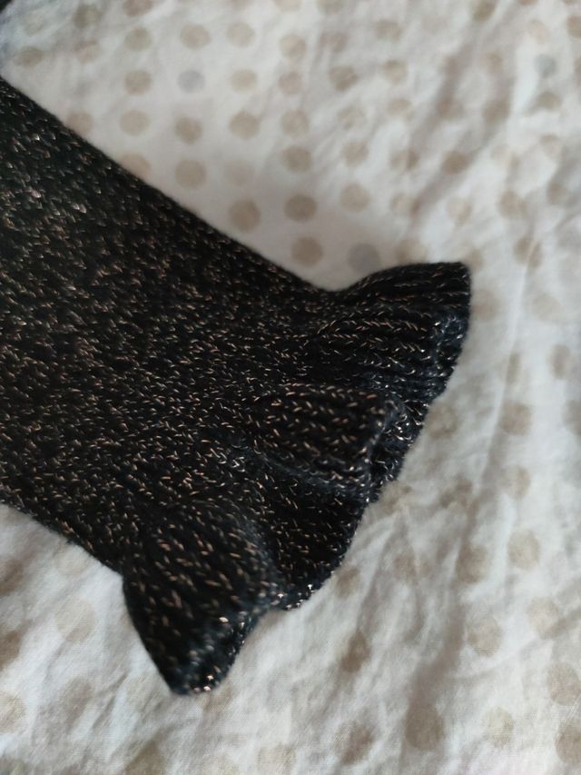 jersey negro con dorado