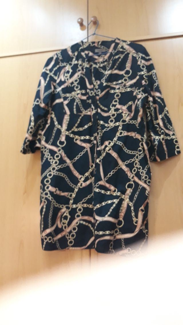 camisa larga cadenas Cortefiel