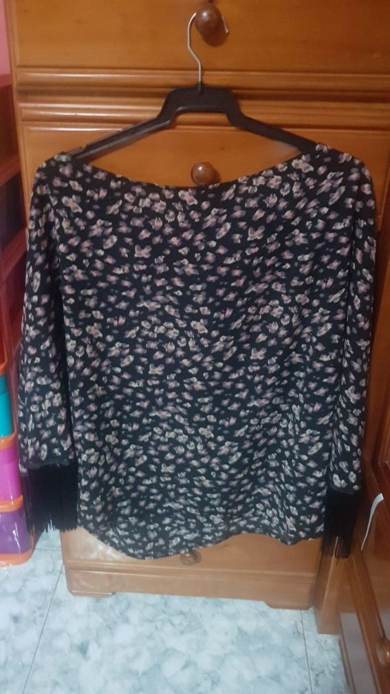 Blusa de flecos