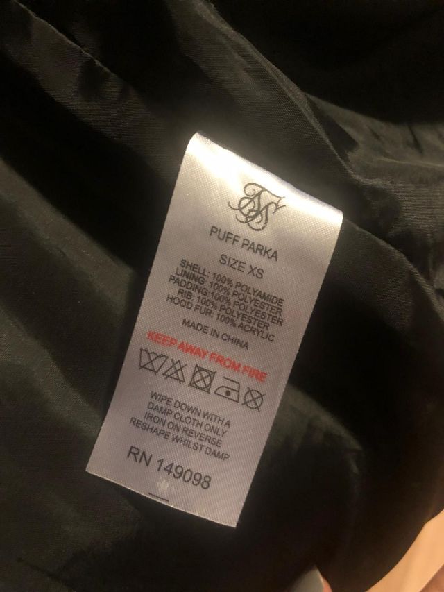 Chaquetón SIK-SILK cálido, muy bien cuidado