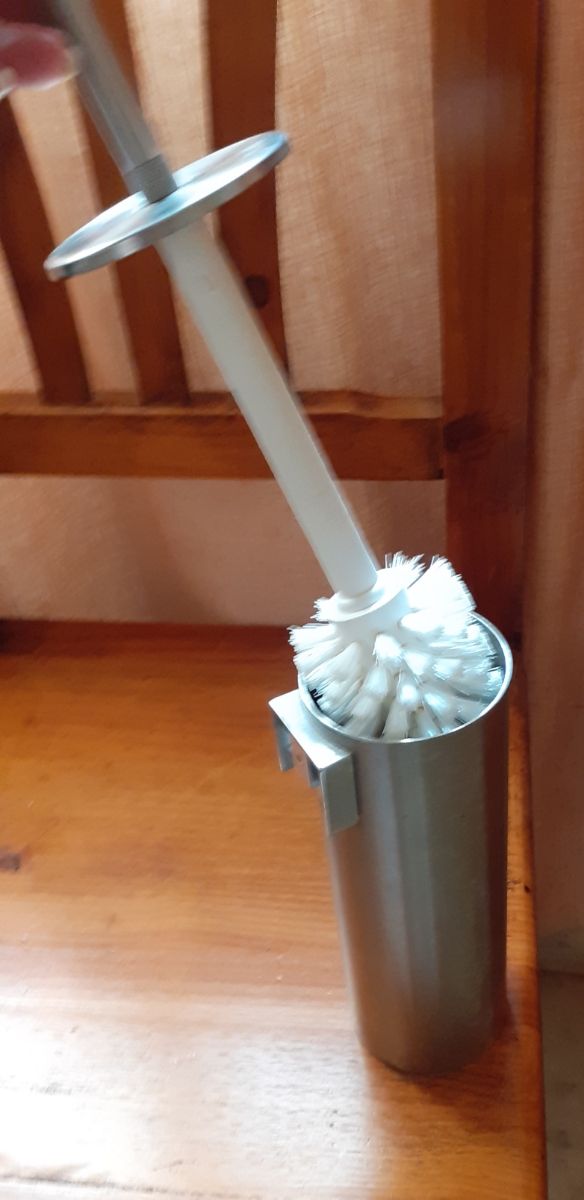 Escobillero acero inoxidable.