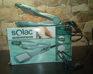 Plancha alisadora de pelo Solac Aqua Style de segunda mano por 8 EUR en  Madrid en WALLAPOP