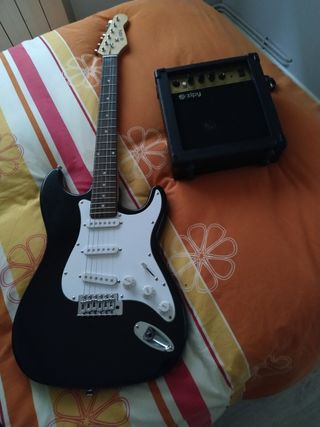Guitarra electrica marca zipy con amplificador y de segunda mano por 100  EUR en Guadalajara en WALLAPOP