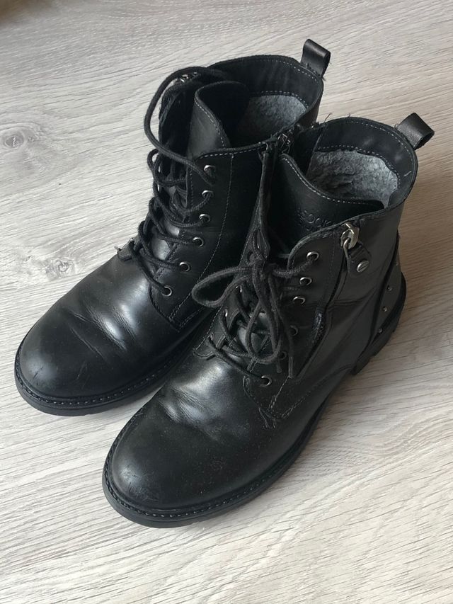 Botas altas em pele genuína