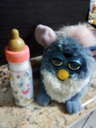 biberones para muñecos