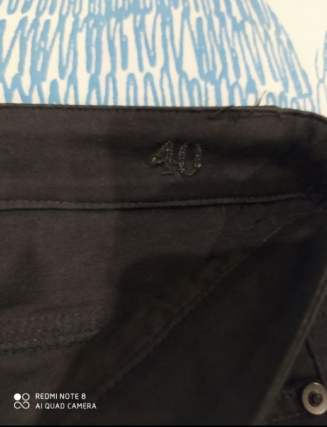 Pantalón vaquero acampanadnegro Jennyfer talla 40.