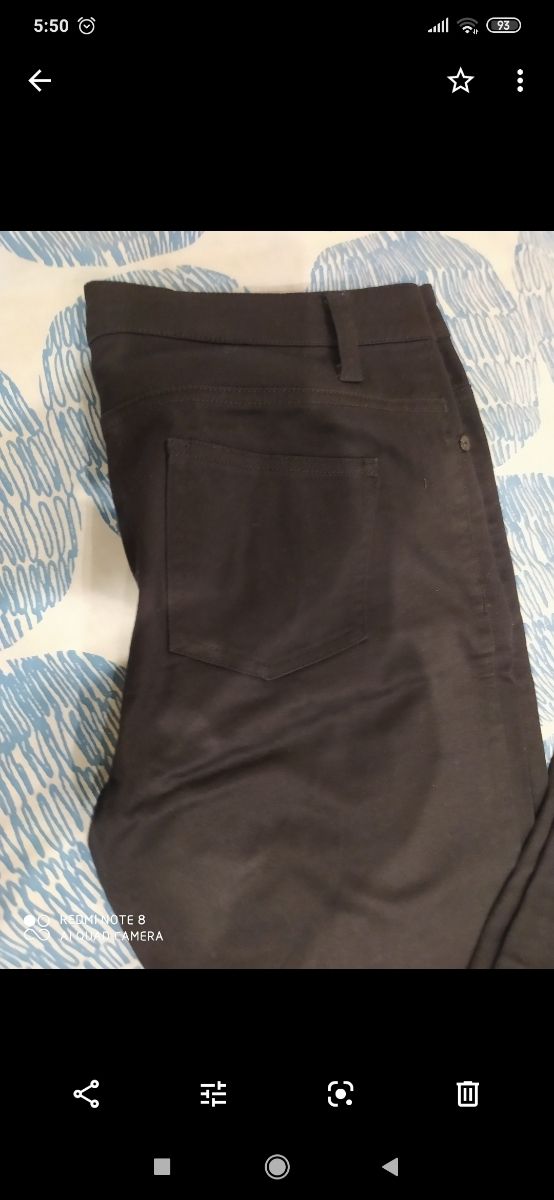 Pantalón vaquero acampanadnegro Jennyfer talla 40.