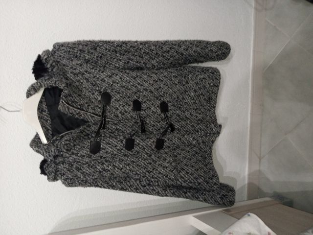 trenka de paño gris,confeccionada en Sevilla