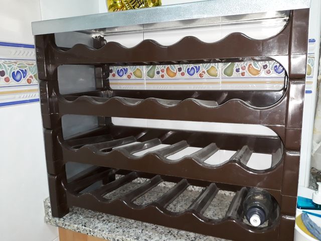 BOTELLERO FORRADO CON CHAPA INOXIDABLE