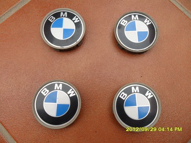 Emblema BMW de portón y tapas de llantas