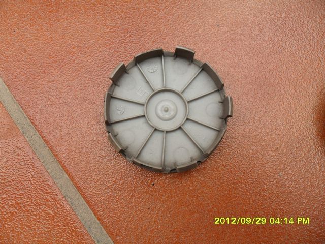 Emblema BMW de portón y tapas de llantas