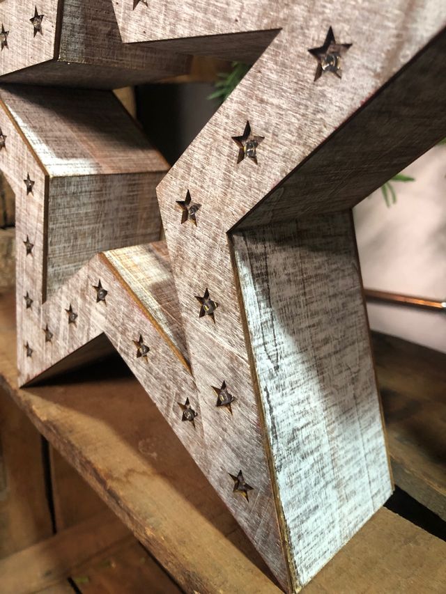 Estrella de madera con luz led cortada a laser 
