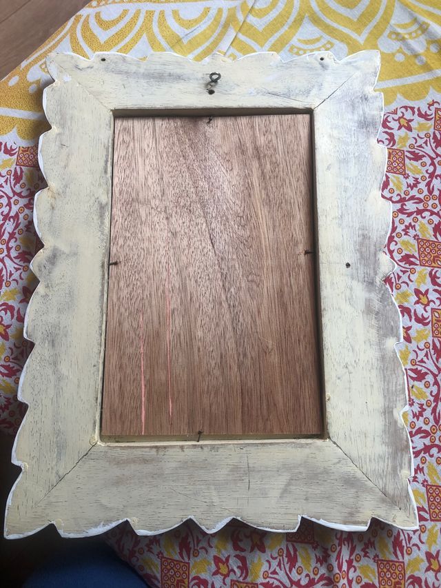 Espejo decorativo de madera lacada