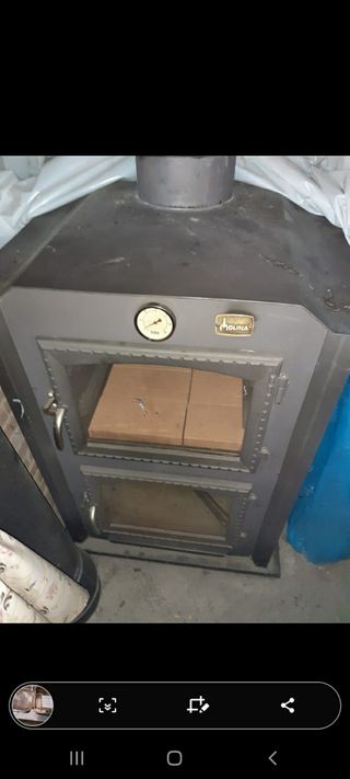 Estufa de leña con Horno de segunda mano en WALLAPOP