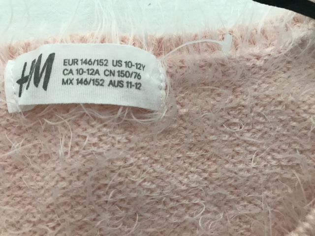 Suéter rosa de pelito H&M talla 10