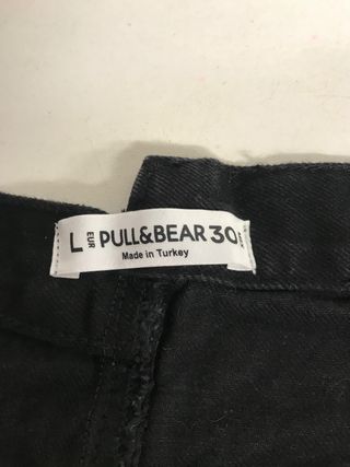FALDA mini NEGRA TEJANA PULL&BEAR T.30