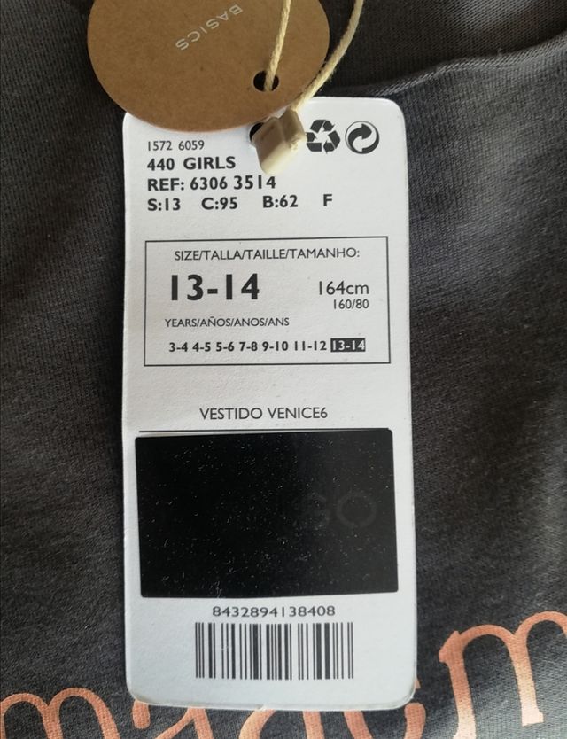 Vestido marrón con la palabra "Mademoiselle"