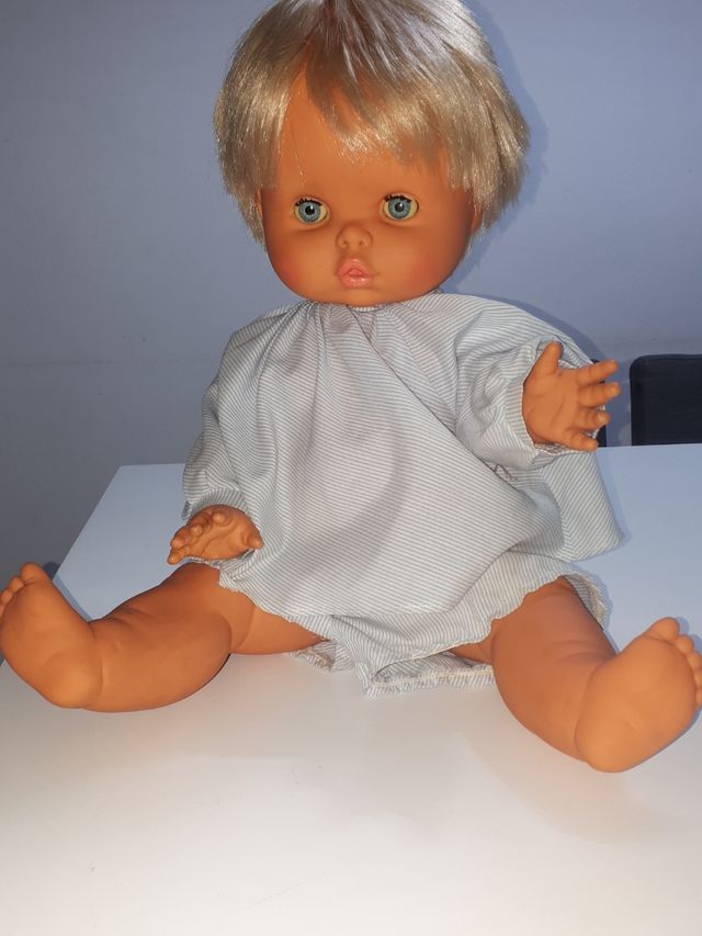 Muñeca bebé 5 lobitos rota