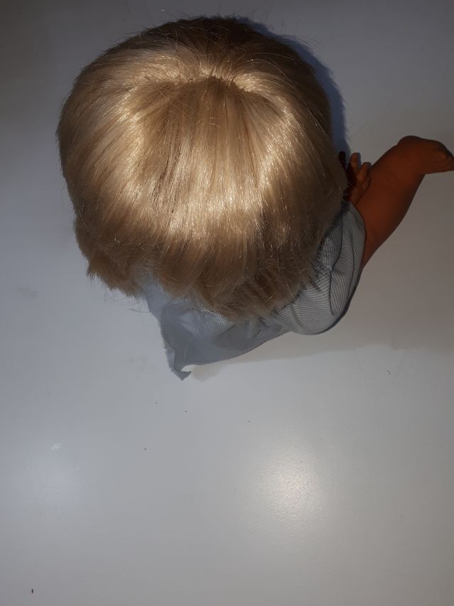 Muñeca bebé 5 lobitos rota