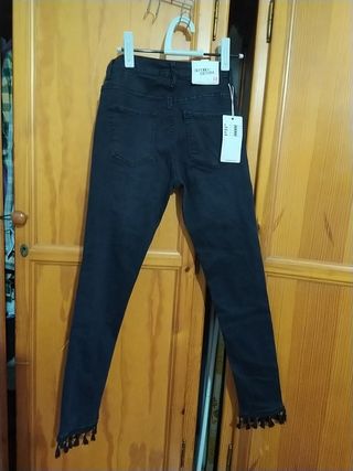 Pantalon negro con flecos abajo Clearance