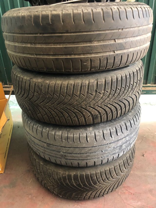 Cuatro llantas con su tapacubos cantidad 4