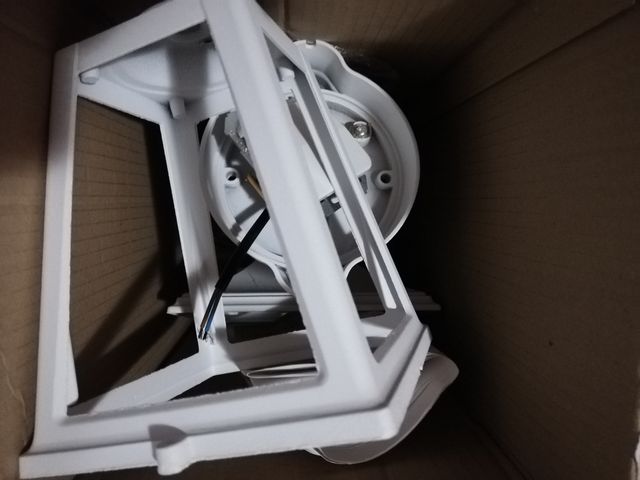 Farol, terraza y jardín