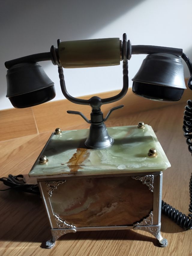 Teléfono antiguo retro mármol onix