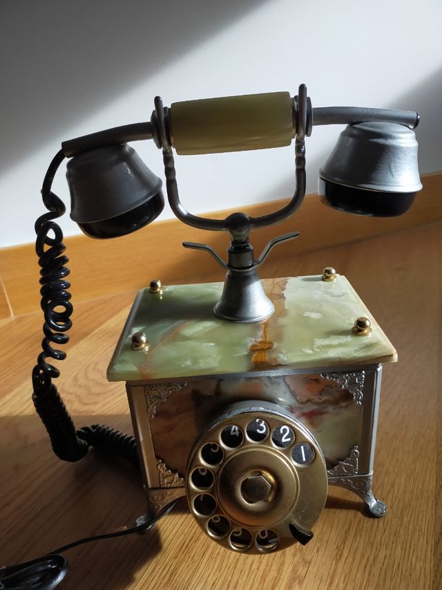 Teléfono antiguo retro mármol onix