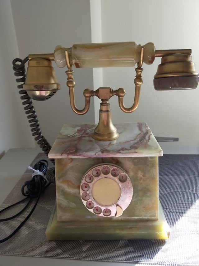 Teléfono antiguo retro mármol onix