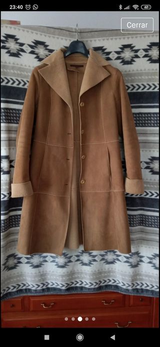 Abrigo de piel vuelta de Zara de segunda mano por 32 EUR en A Coruña en  WALLAPOP