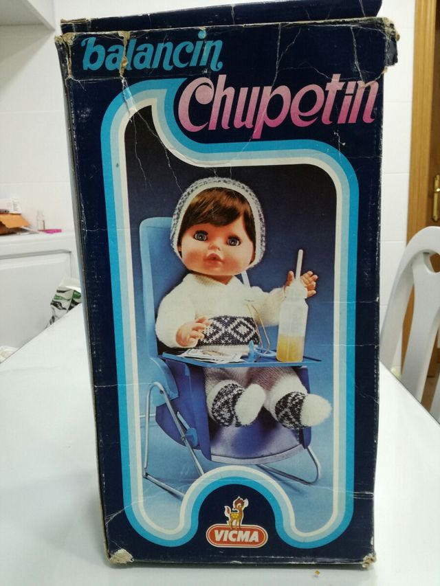 Balancín vintage muñeco chupetín