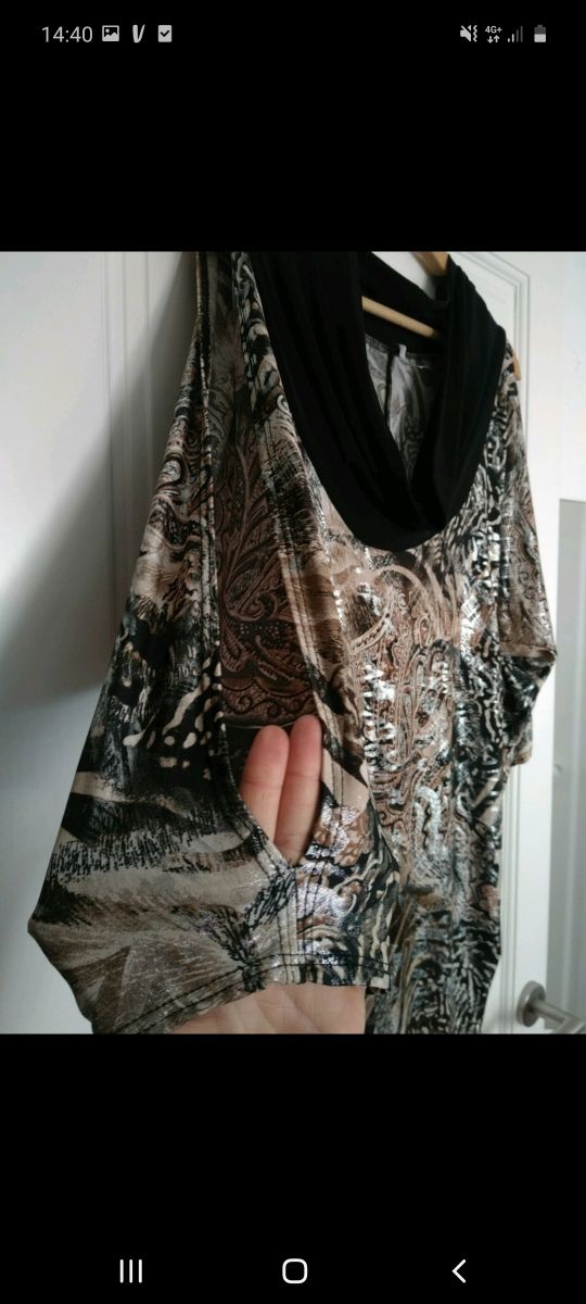 vestido dorado y negro