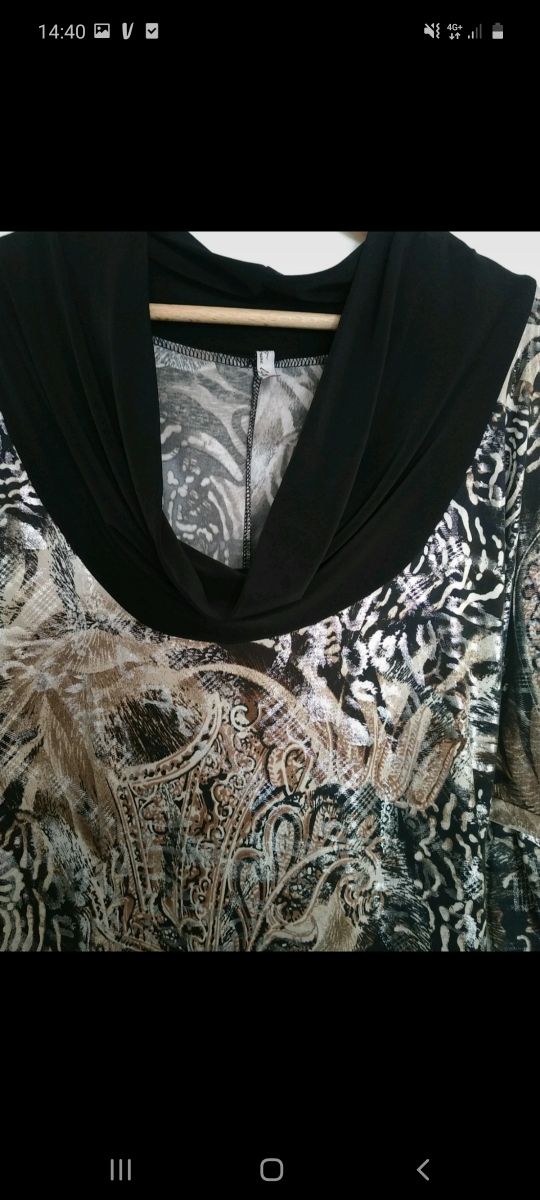 vestido dorado y negro