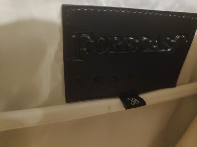 chaqueta de piel blanca