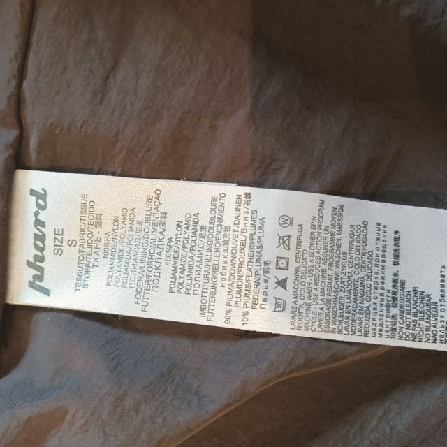 Plumifero marrón de pluma. Marca PHARD