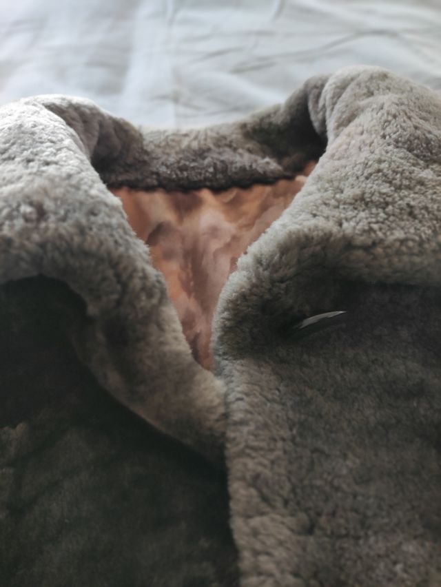 abrigo corto como de pelo