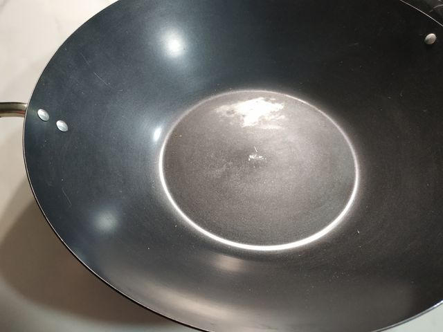 wok con libro de recetas 