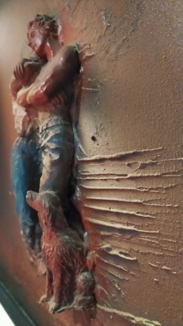 Cuadro en relieve montado sobre marco negro