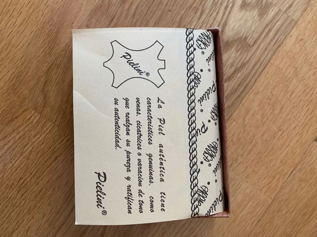 Cartera de piel sin estrenar