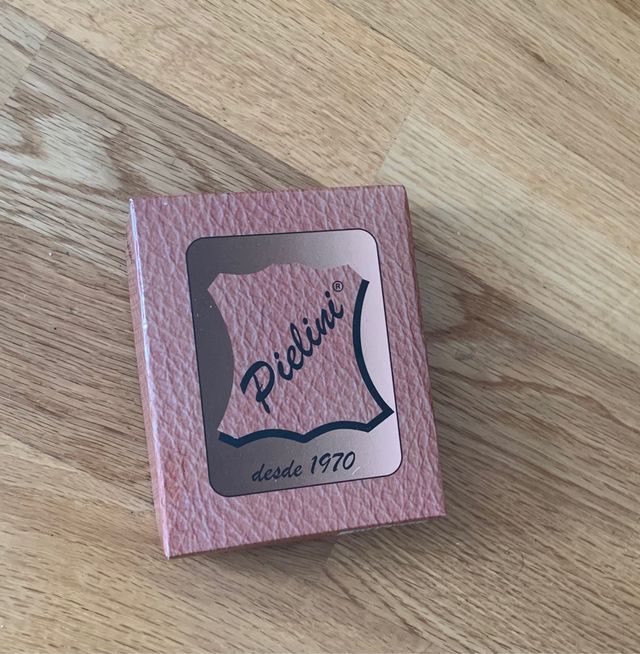 Cartera de piel sin estrenar