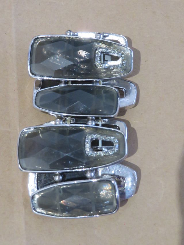 Pulsera ajustable de metal y plástico