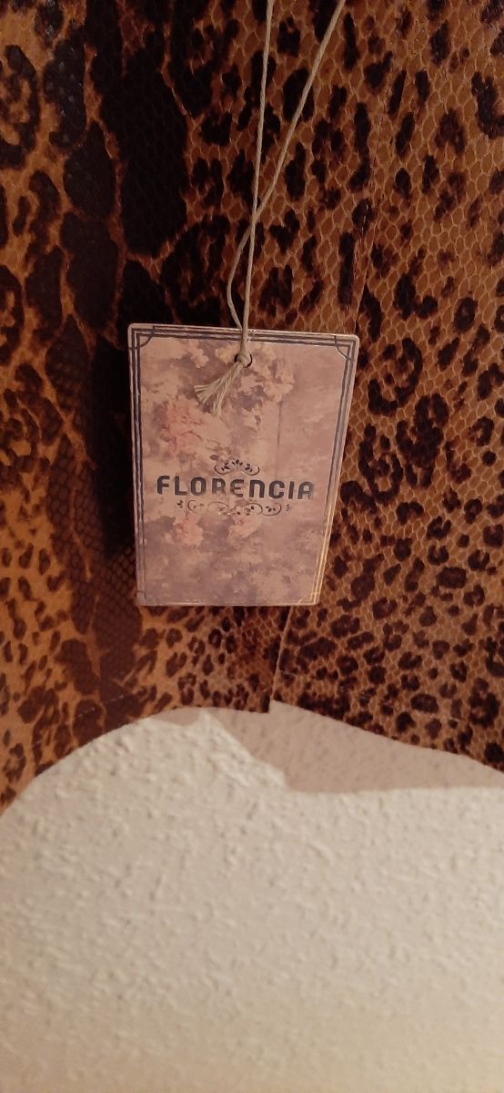 Chaqueta larga. cuello solapa