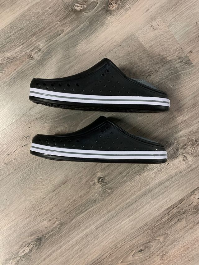 Zapatos de goma impermeables