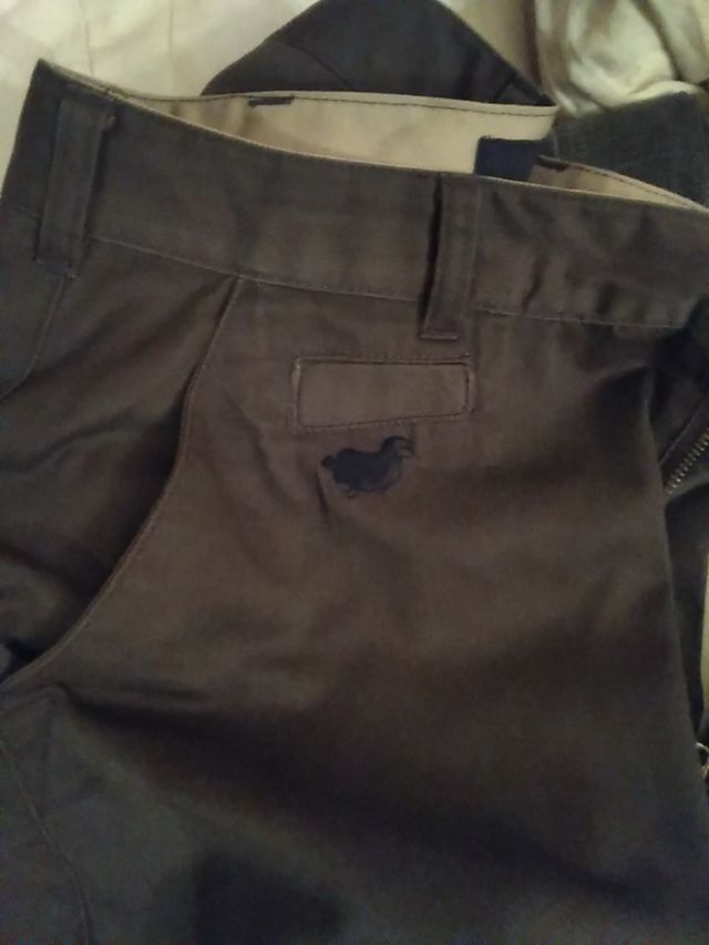 pantalón chico verde oscuro marca LOST