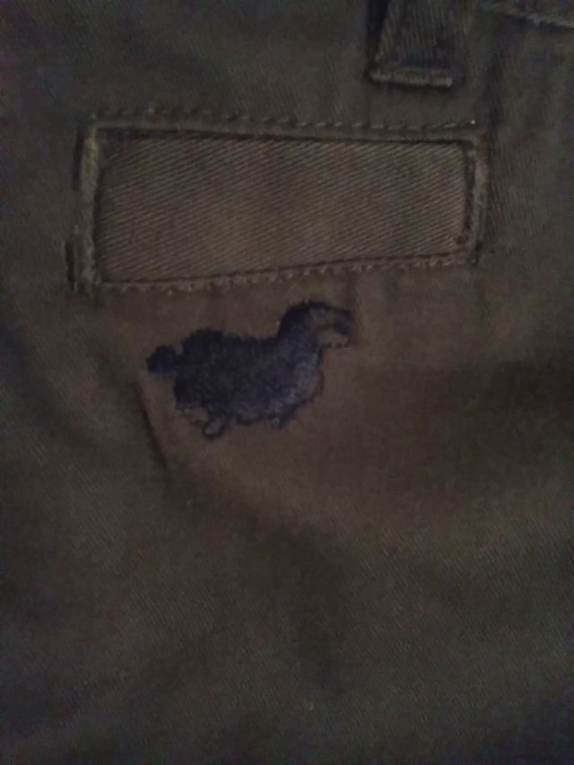 pantalón chico verde oscuro marca LOST