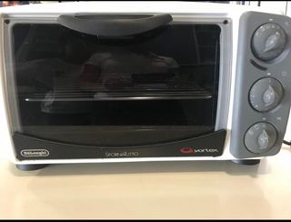 Horno SFORNATUTTO DE DELONGHI de segunda mano por 40 EUR en Barcelona en  WALLAPOP